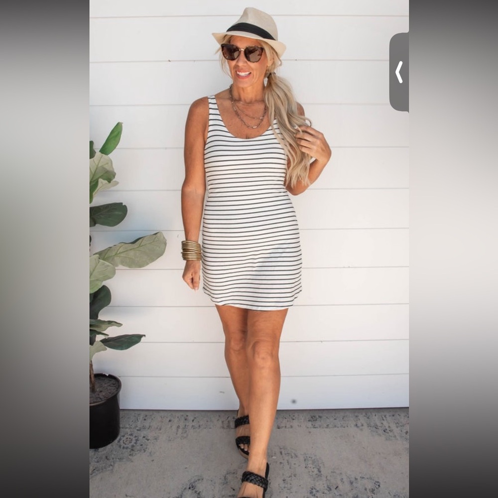 Sleeveless black and white dress with shorts